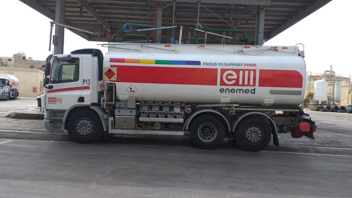 An Enemed fuel bowser with rainbow stripes and the words Proud to support Pride